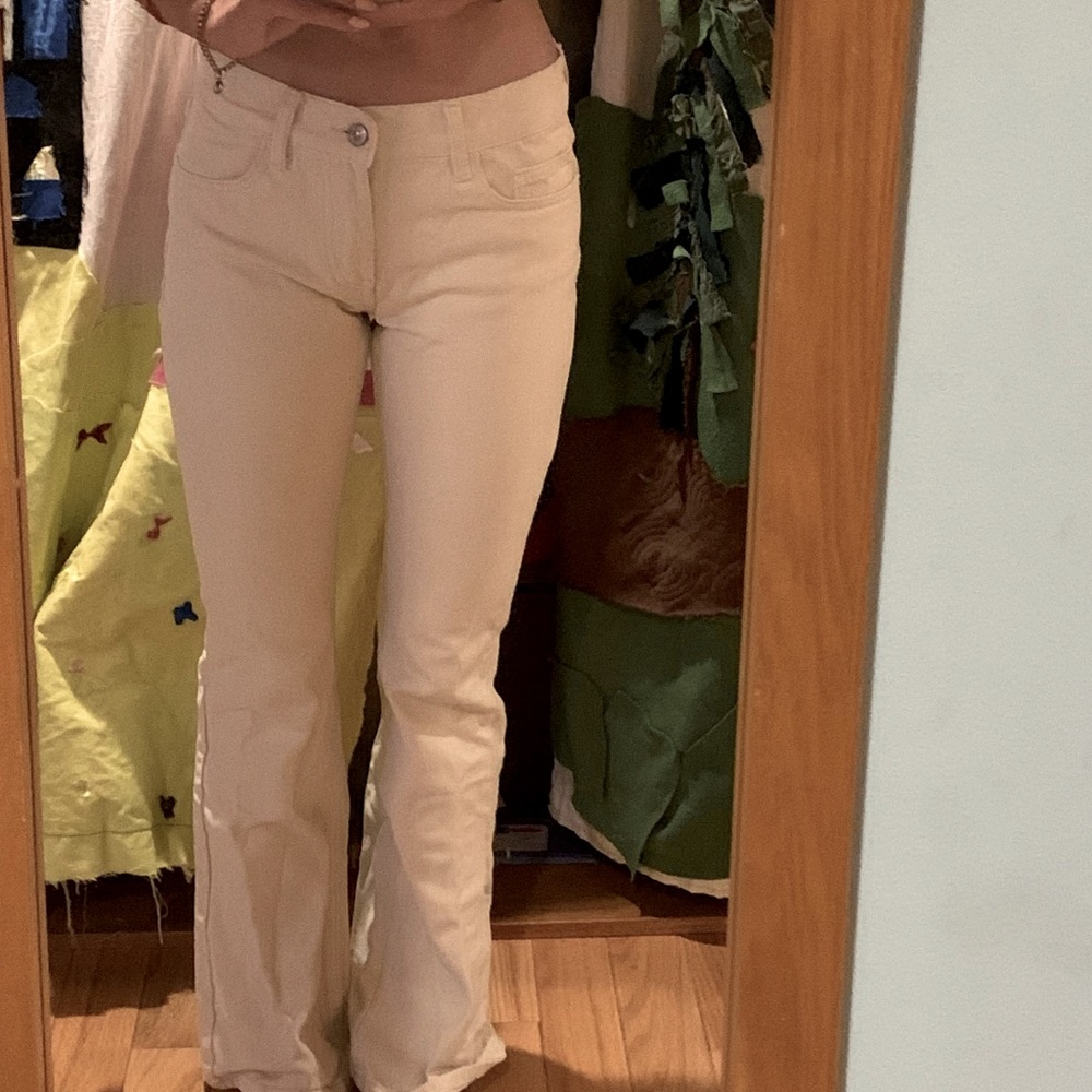 Cream low rise flair leg J-galt jeans size small long legs